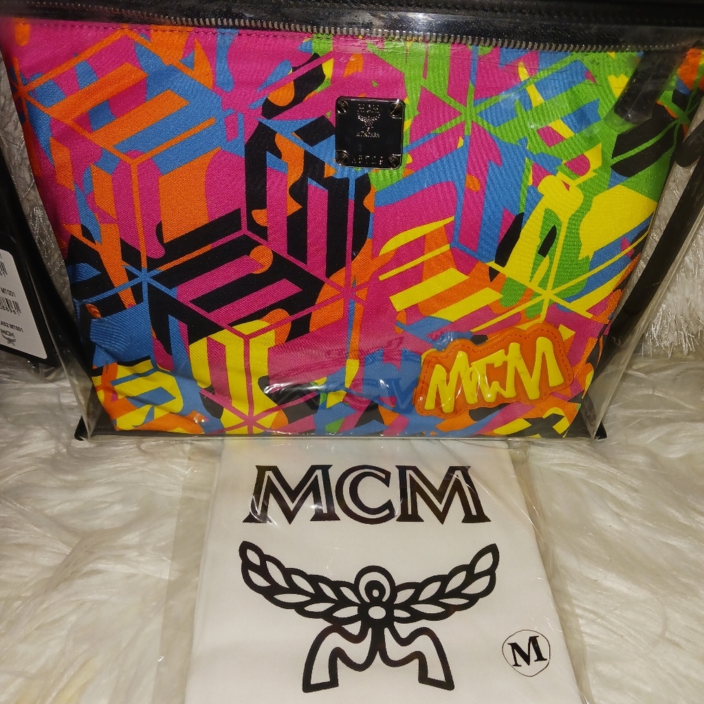 MCM Portugal clear monogram large wristlet  pouch